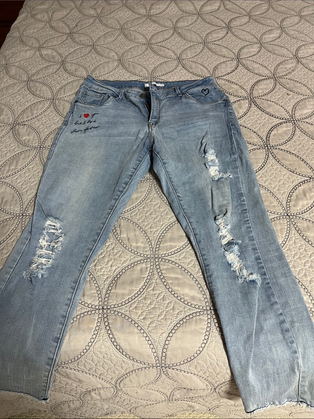 Light Wash Distressed Womenโs Boyfriend Jeans